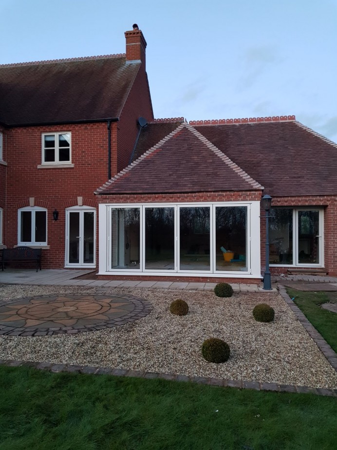 Doors and windows fitted in an extension