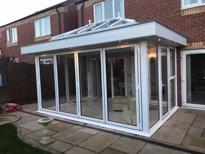 Orangery Installed With Four Pane Bi Fold, Two Single Doors and a French Door