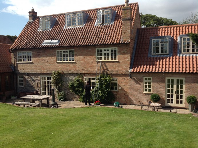 Full House Installed With Cream Windows