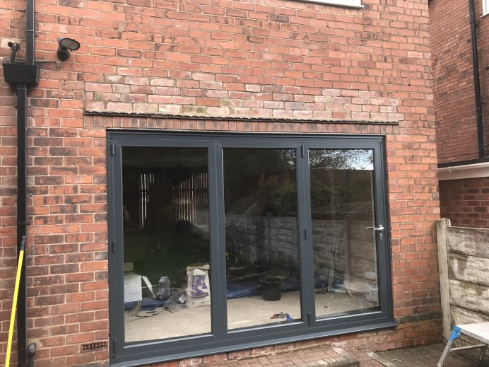 French Doors Transformed into a Three Pane Bi Fold Door