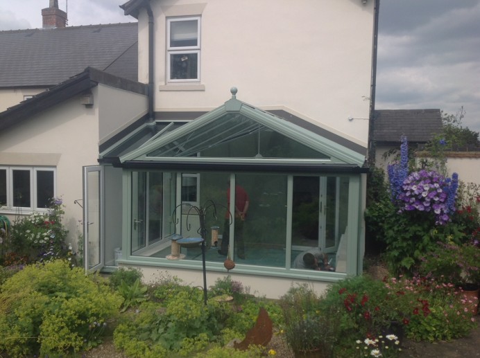 White uPVC Conservatory Transformed into Rehau Chartwell Green