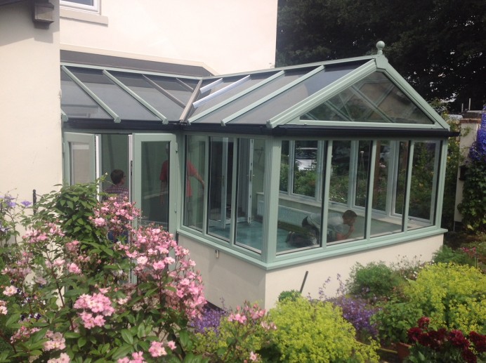 White uPVC Conservatory Transformed into Rehau Chartwell Green Conservatory