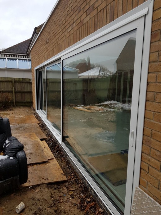 Three Pane Dutemann Glide S Sliding Door Installation with Two Skylights