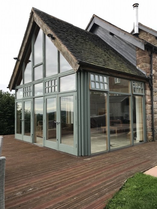 Gable Window and Bi Fold Doors Installed at Customers Property