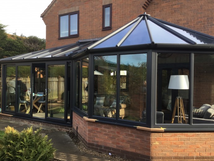 P Shape Conservatory Installed Across Rear of Customers House