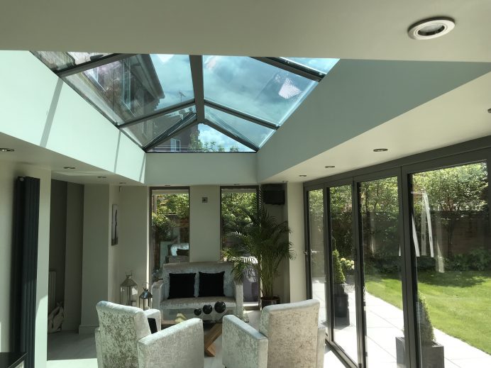 Dark Silver Metallic Orangery Built at the Back of Home