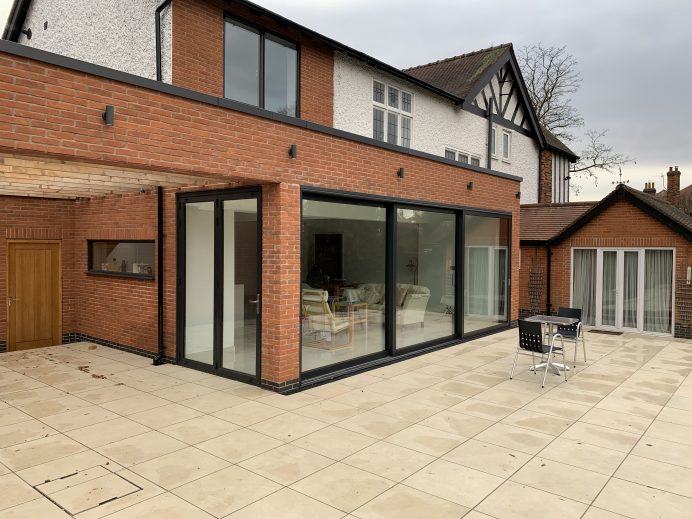 Dutemann Glide S Sliding Door and a Single Door and Side Panel Fitted in New Extension